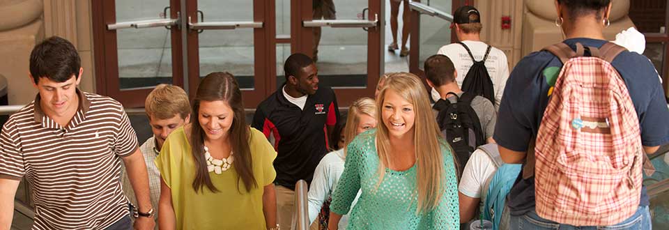 happy faces walking through the school